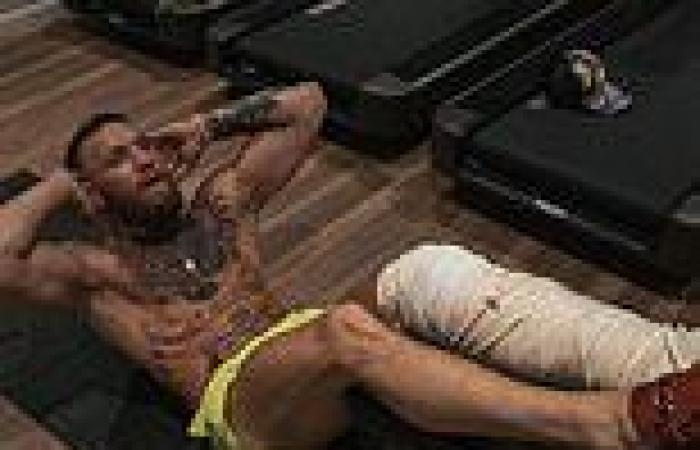 sport news Conor McGregor back in the gym ALREADY in a full cast despite breaking his leg ...