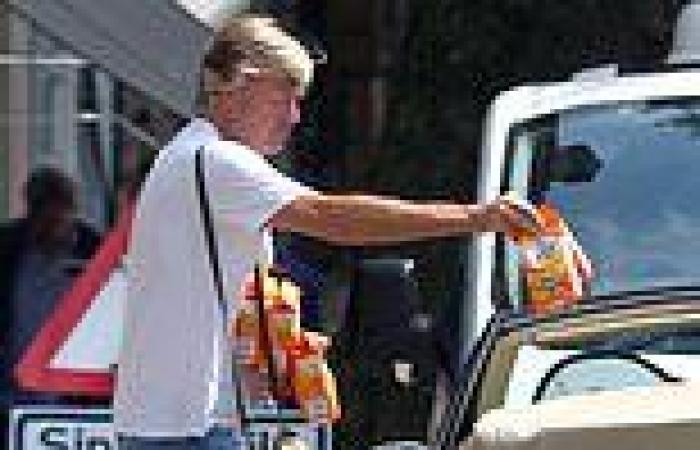 Richard Madeley stocks up on American cheese crackers at a deli 