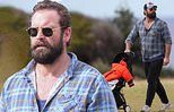 Home and Away star looks unrecognisable with a bushy beard during Sydney's ...