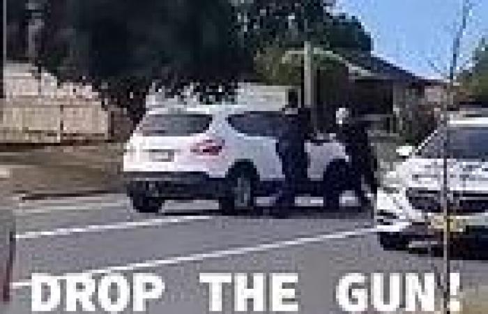 Shocking moment alleged car thieves pull a gun on cops in Sydney