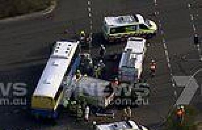 Two passengers trapped in a wreckage after a school bus crashed with a truck in ...