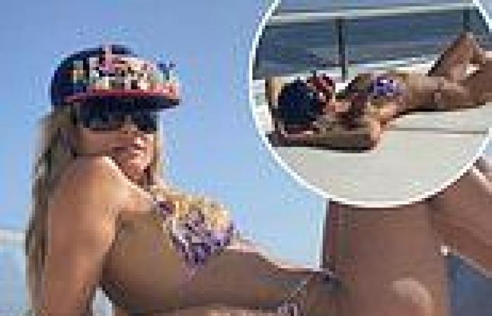 Heidi Klum, 48, drops jaws in tiny purple bikini before cosying up to husband ...