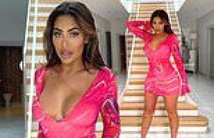 Chloe Ferry showcases her hourglass figure in plunging pink mini dress posing ...