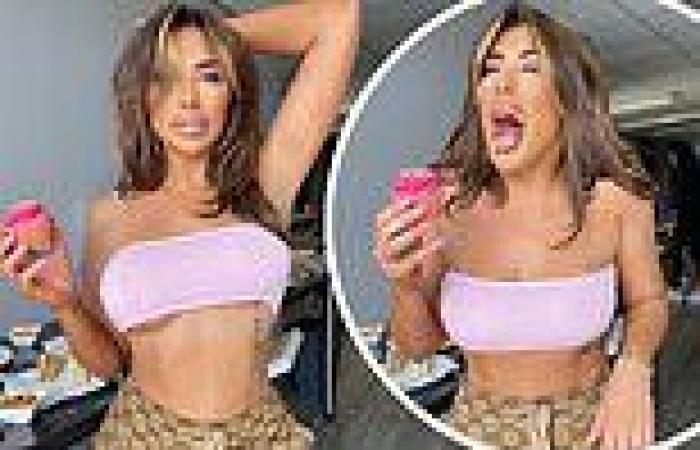 Chloe Ferry flashes underboob and displays her washboard abs in TINY crop top