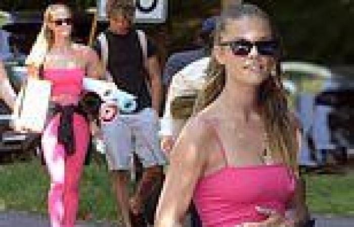 Nina Agdal teases her taut abs in hot pink after yoga with beau Jack ...
