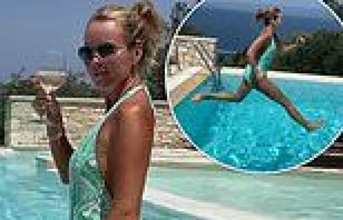 Amanda Holden, 50, looks sensational in a green swimsuit as she pulls off ...