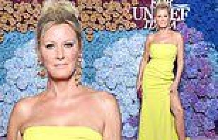 Sandra Lee, 55, shows a lot of leg in a sexy slit dress