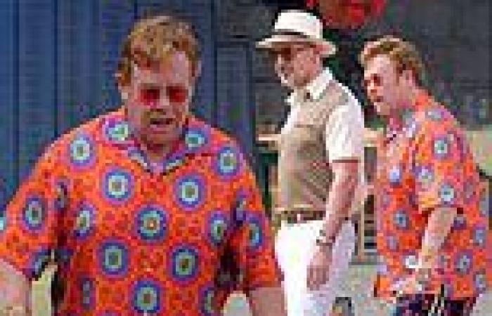 Elton John dons a vibrant Gucci shirt as he steps out with husband David ...