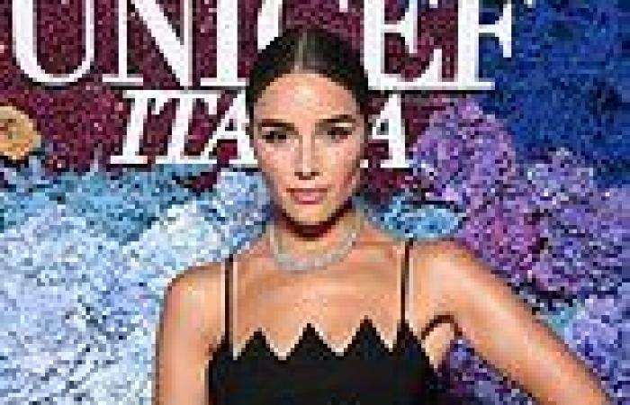 Olivia Culpo flaunts her washboard abs in daring cut-out LBD in Capri