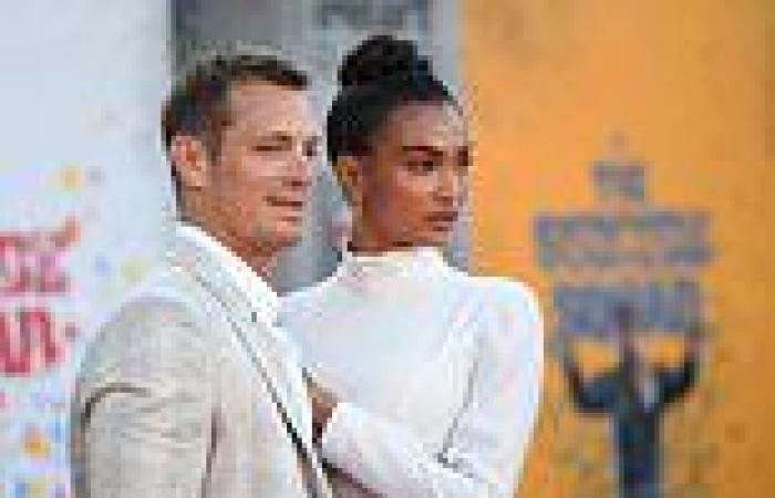 Kelly Gale packs on the PDA with Joel Kinnaman at The Suicide Squad premiere