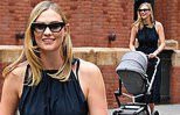 Karlie Kloss is NYC chic in a sleek black dress as she steps out for a stroll ...