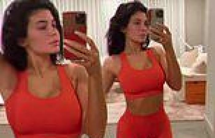 Kylie Jenner flaunts a fresh-faced after exercise glow while showing off her ...