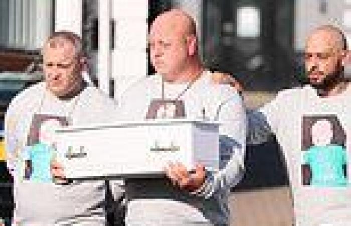 Father breaks down as he cradles casket of his eight-week-old son allegedly ...