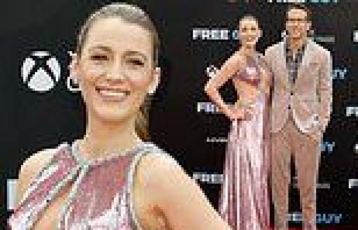 Blake Lively poses with husband Ryan Reynolds on red carpet at premiere of Free ...