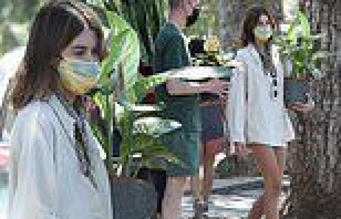 Kaia Gerber looks summer chic as she shows off her toned legs while stocking up ...