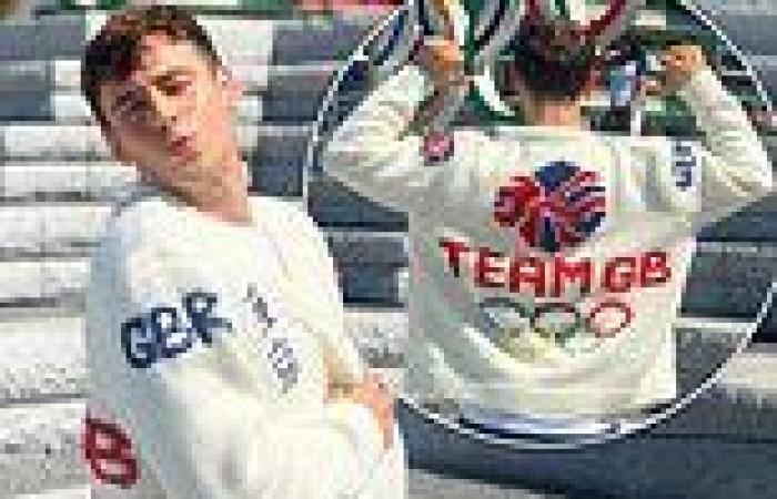 Olympic champion Tom Daley shows off his finished Team GB cardigan at Tokyo 2020