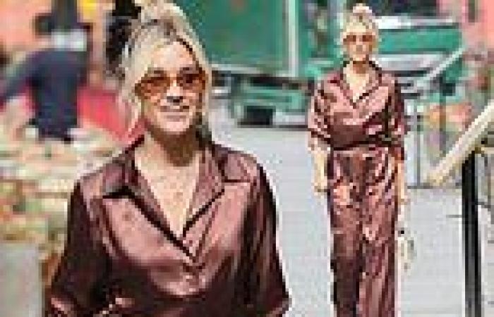 Ashley Roberts looks sensational in a chocolate brown jumpsuit as she arrives ...