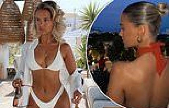 Molly-Mae Hague poses sultrily in a busty off-white bikini in Santorini