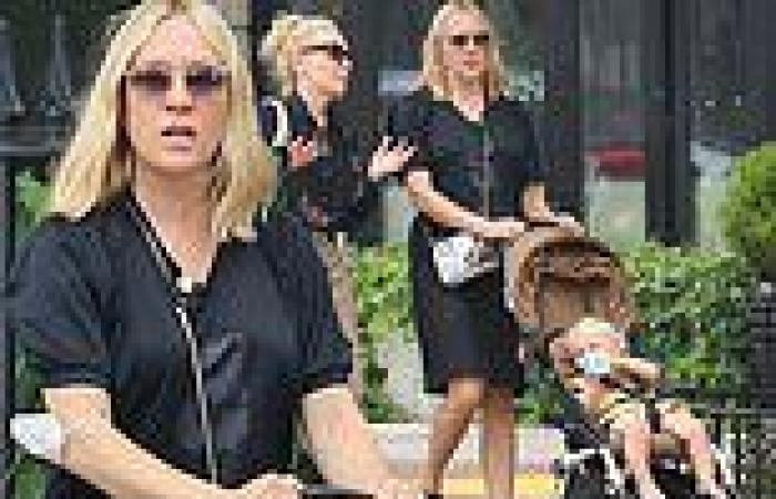 Chloe Sevigny wears black dress as she takes one-year-old son, Vanja, on walk ...