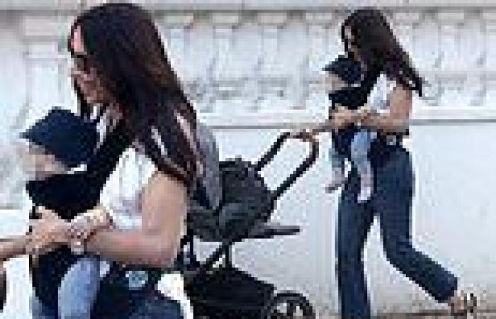 Christine Lampard looks every inch the doting mum on walk with Freddie
