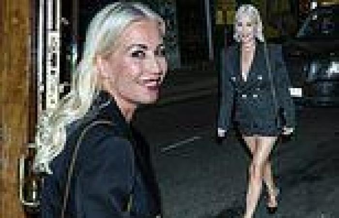 Denise Van Outen shows off her slender legs in tiny hot pants and heels as she ...