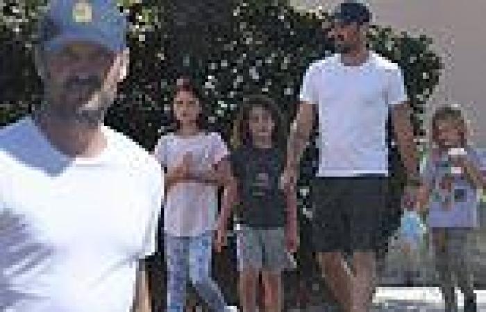 Brian Austin Green goes shopping for pet supplies with his three children in ...