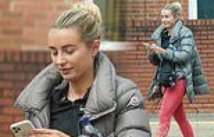 Make-up free Dani Dyer shrugs on a designer padded jacket as she steps out in ...