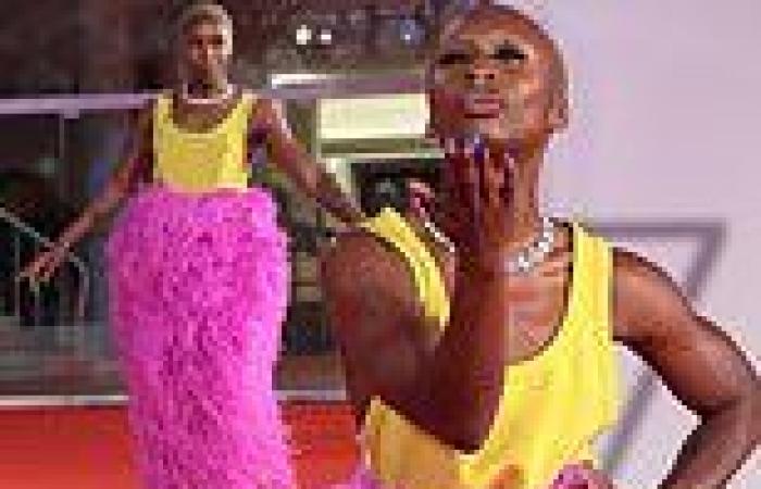 Cynthia Erivo makes a glam fashion statement in a yellow top and feathered pink ...