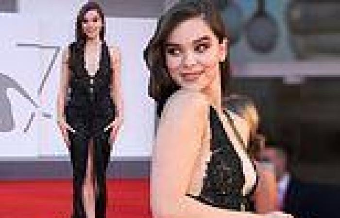 Hailee Steinfeld flashes her toned pins in a thigh-split black gown during the ...
