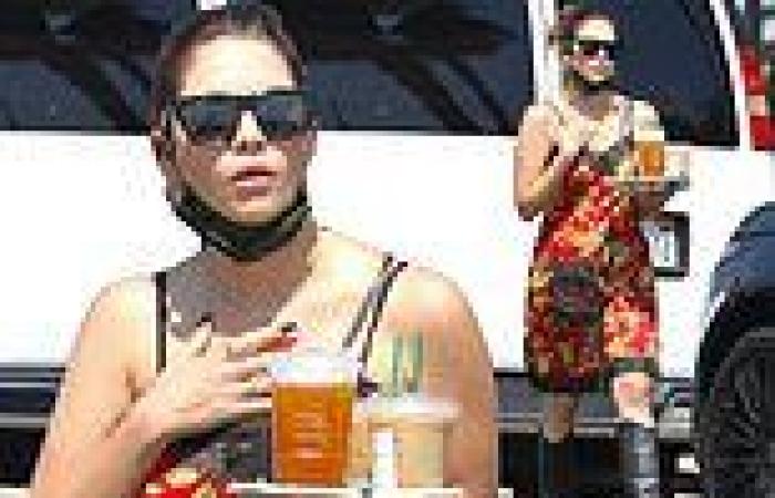 Ashley Benson dons a floral slip dress and cowboy boots as she picks up ...