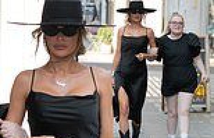 Chloe Sims looks chic in satin black dress as she steps out with ...