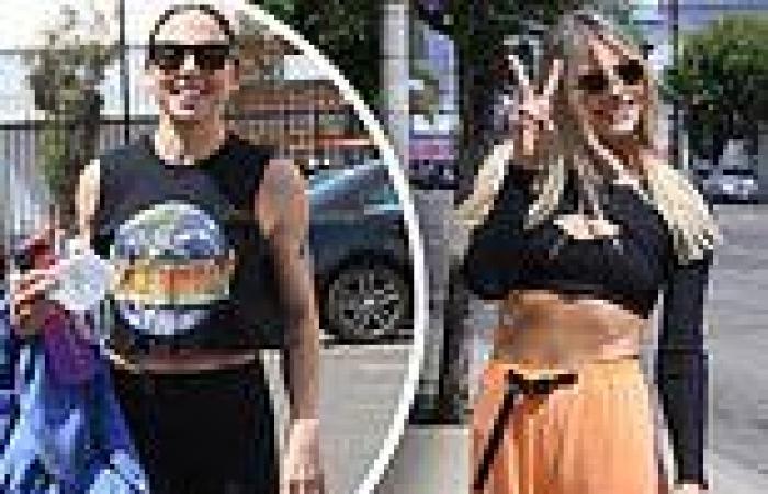 Amanda Kloots shows off her taut abs and flashes a peace sign as she heads to ...