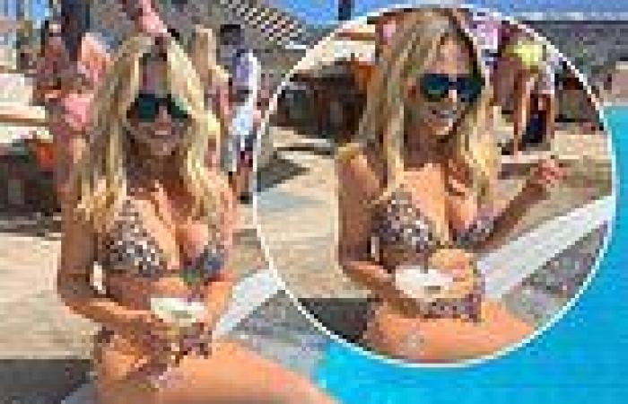 Emily Atack flaunts jaw-dropping curves in a skimpy leopard print bikini in ...