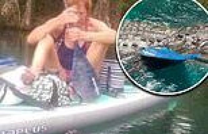 Terrifying moment Florida woman on a paddleboard is stalked by aggressive ...