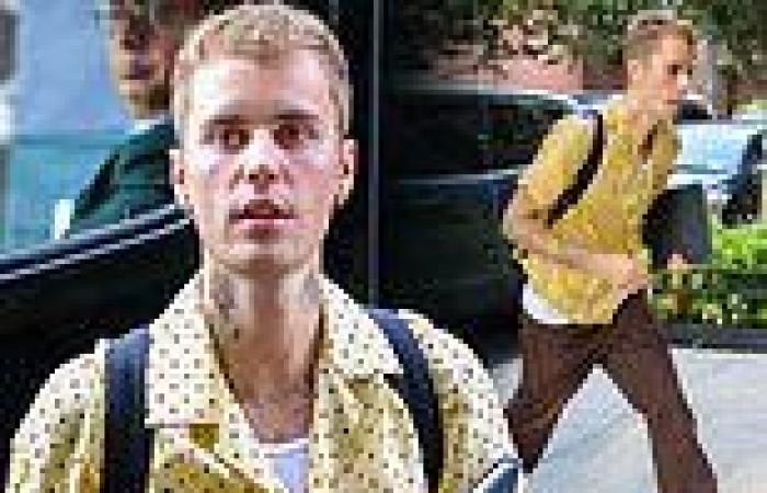Justin Bieber rocks a yellow polka dot shirt as he heads out in NYC