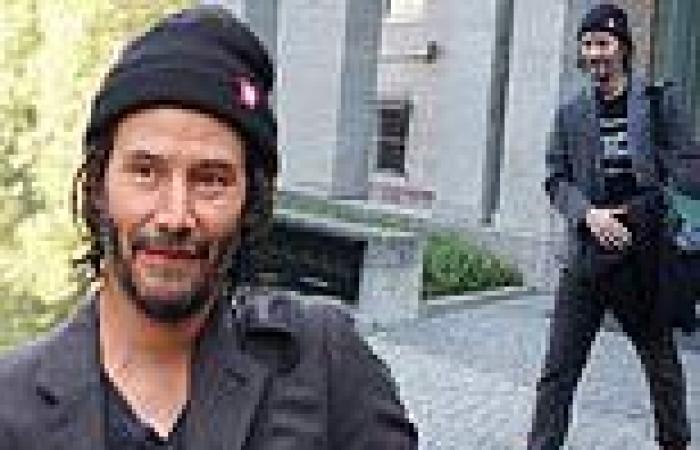 Keanu Reeves puts comfort over fashion in slippers and a beanie after trailer ...