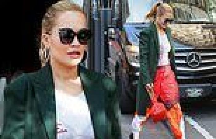 Rita Ora showcases her unique style with a green longline blazer and shell suit ...
