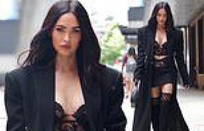 Megan Fox makes jaws drop in a lace bralette and matching stockings in New York ...