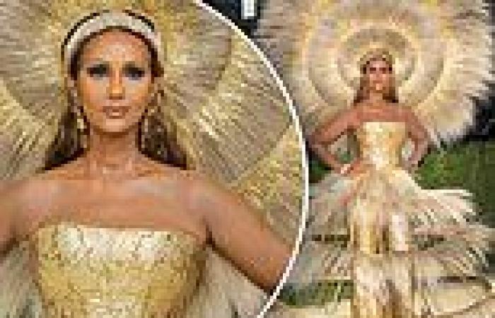 Iman, 66, is radiant as she rocks a giant gold headdress on the red carpet of ...