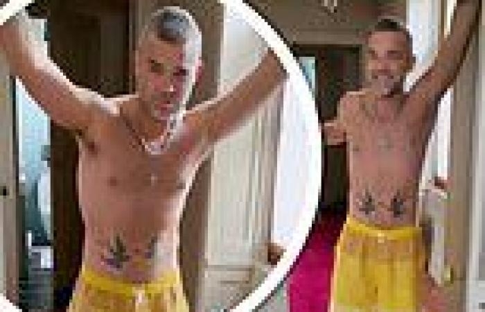 'Not afraid to be sexy': Robbie Williams poses shirtless and delivers a series ...