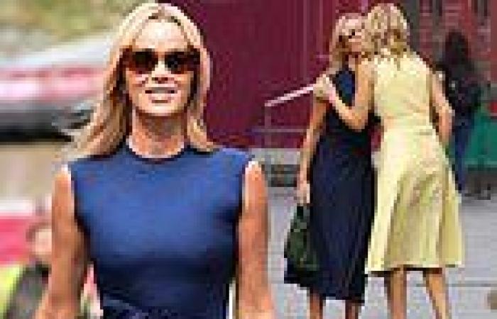 Amanda Holden showcases her enviable frame in navy maxi dress as she puckers up ...