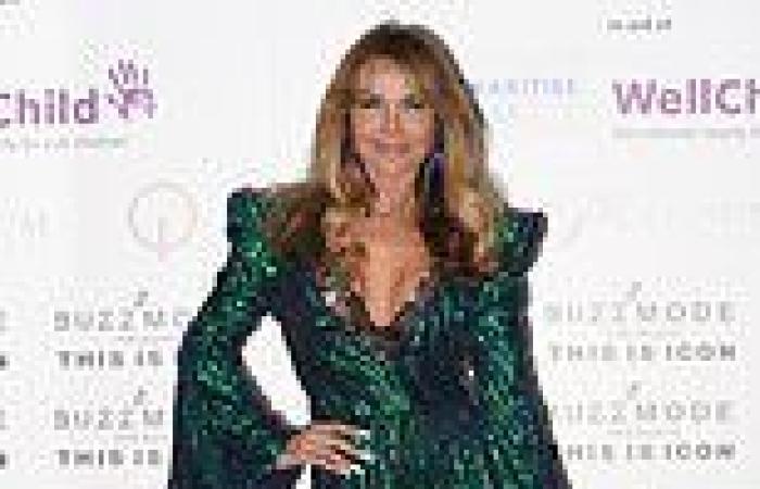 Lizzie Cundy puts on a busty display in a plunging green sequinned jumpsuit at ...