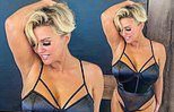 Kerry Katona sends temperatures soaring as she poses in a racy corset for ...