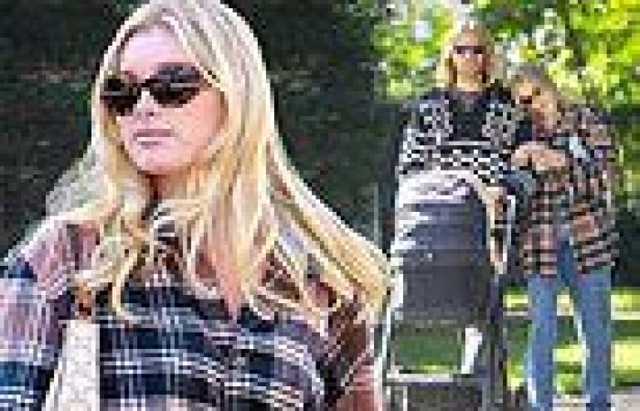Elsa Hosk snuggles up to her boyfriend Tom Daly during relaxing stroll with ...