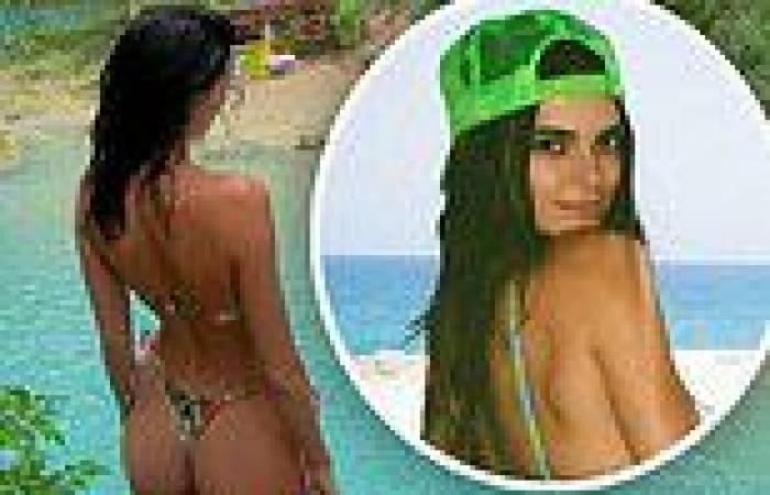 Kendall Jenner puts on a VERY cheeky display in itty bitty thong bikini