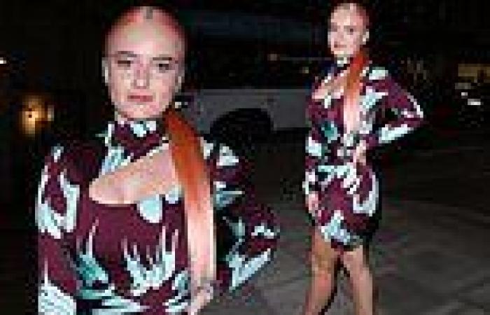 Clean Bandit's Grace Chatto shows her curves in an abstract print wrap dress ...