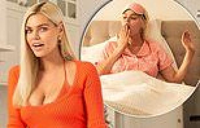 Sophie Monk, 41, flaunts her famous cleavage in a plunging orange dress