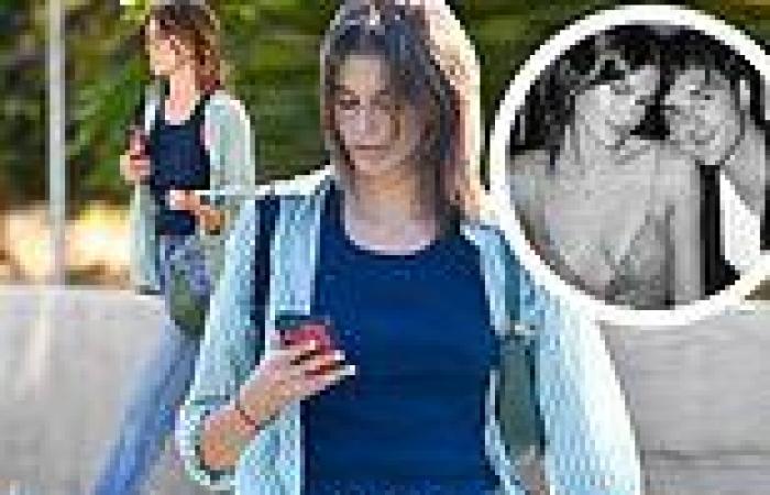 Kaia Gerber models a tank top and jeans to pick up an organic lunch