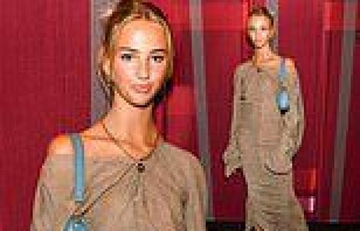 Romeo Beckham's girlfriend Mia Regan looks chic in a slouchy beige dress at the ...