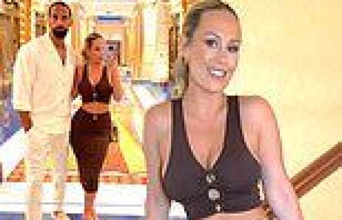 Kate Ferdinand flaunts her incredible abs in a plunging brown co-ord on holiday ...